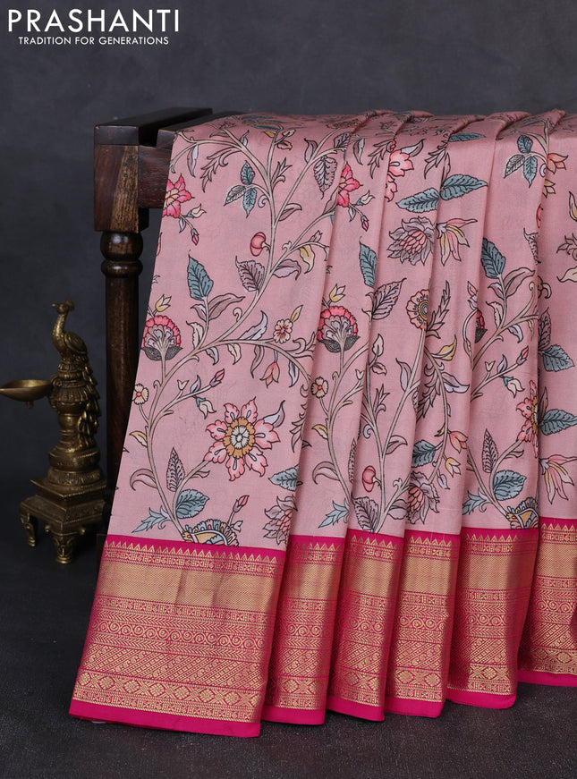 Pure kanchipuram silk saree pastel pink and pink with allover floral digital prints and rich zari woven border