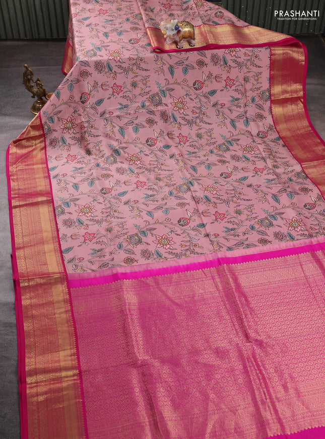 Pure kanchipuram silk saree pastel pink and pink with allover floral digital prints and rich zari woven border