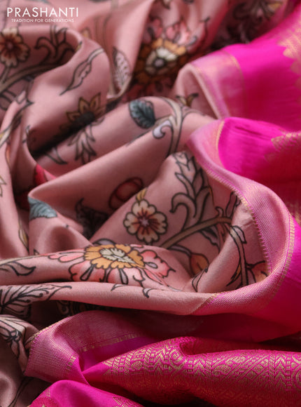 Pure kanchipuram silk saree pastel pink and pink with allover floral digital prints and rich zari woven border