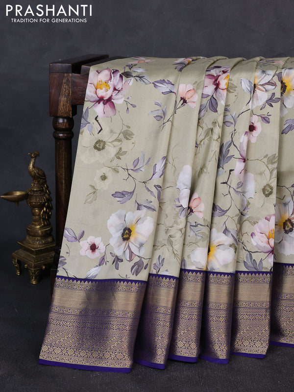 Pure kanchipuram silk saree elaichi green and dark blue with allover floral digital prints and rich zari woven border
