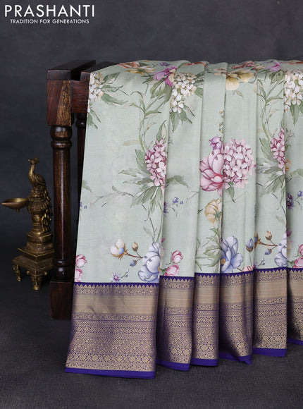 Pure kanchipuram silk saree pastel green and dark blue with allover floral digital prints and rich zari woven border