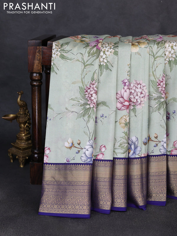 Pure kanchipuram silk saree pastel green and dark blue with allover floral digital prints and rich zari woven border