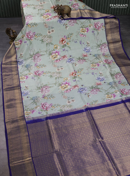 Pure kanchipuram silk saree pastel green and dark blue with allover floral digital prints and rich zari woven border