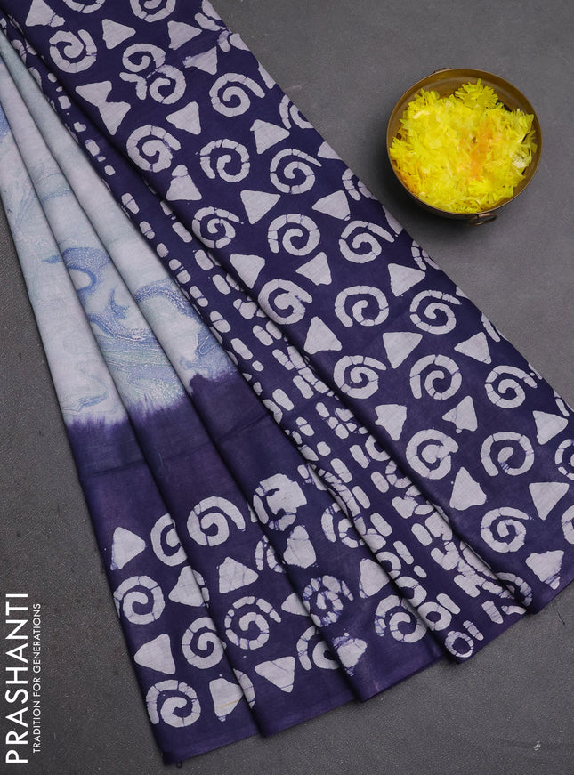 Batik cotton saree multi colour and navy blue with allover prints and batik printed border