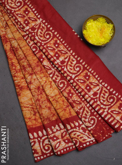 Batik cotton saree mustard yellow and maroon with allover prints and batik printed border