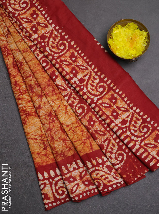 Batik cotton saree mustard yellow and maroon with allover prints and batik printed border