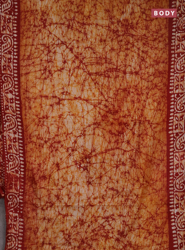 Batik cotton saree mustard yellow and maroon with allover prints and batik printed border