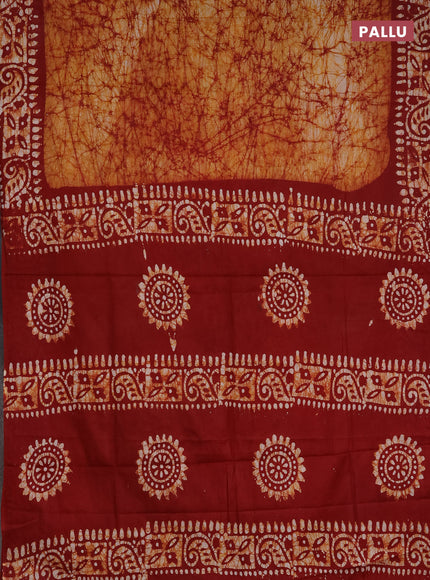 Batik cotton saree mustard yellow and maroon with allover prints and batik printed border