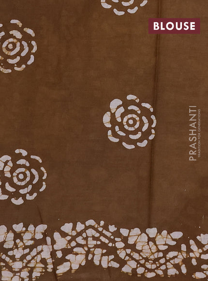 Batik cotton saree purple and mustard green with allover prints and batik printed border