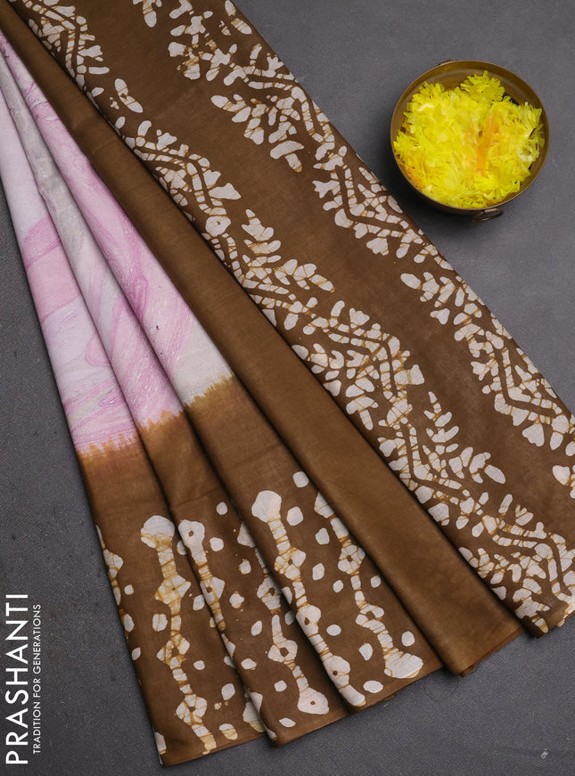 Batik cotton saree pink and mustard green with allover prints and batik printed border