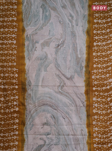 Batik cotton saree multi colour and dark mustard with allover prints and batik printed border