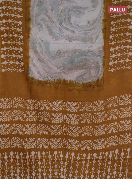 Batik cotton saree multi colour and dark mustard with allover prints and batik printed border