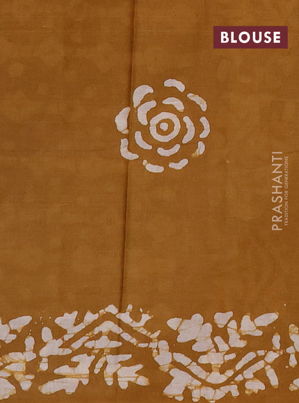 Batik cotton saree multi colour and dark mustard with allover prints and batik printed border