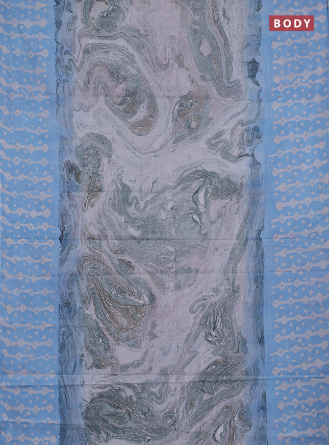 Batik cotton saree multi colour and light blue with allover prints and batik printed border