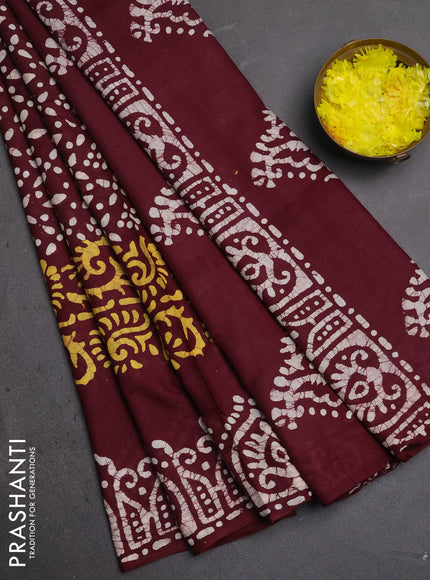 Batik cotton saree deep maroon with allover prints and batik printed border