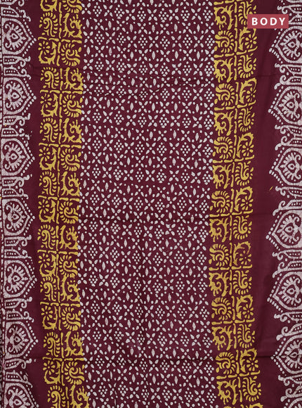 Batik cotton saree deep maroon with allover prints and batik printed border