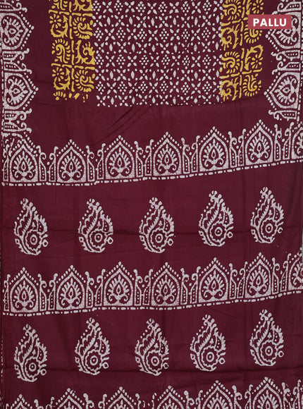 Batik cotton saree deep maroon with allover prints and batik printed border
