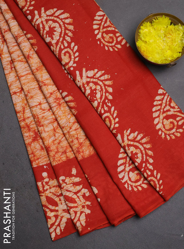 Batik cotton saree rust shade with allover prints and batik printed border