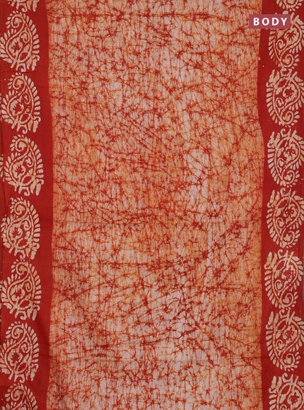 Batik cotton saree rust shade with allover prints and batik printed border