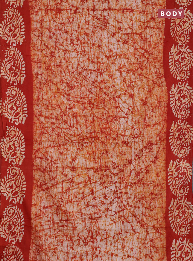 Batik cotton saree rust shade with allover prints and batik printed border