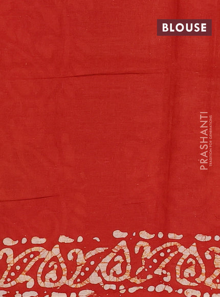 Batik cotton saree rust shade with allover prints and batik printed border