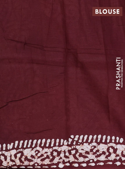 Batik cotton saree deep maroon with allover prints and batik printed border