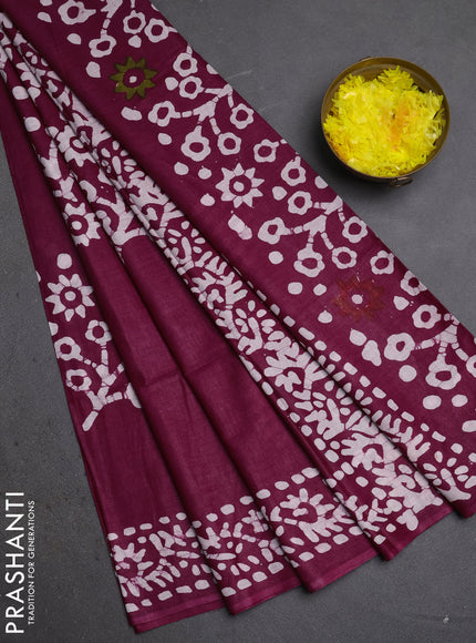 Batik cotton saree wine shade with batik butta prints and batik printed border