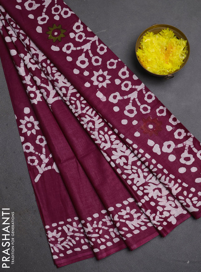 Batik cotton saree wine shade with batik butta prints and batik printed border