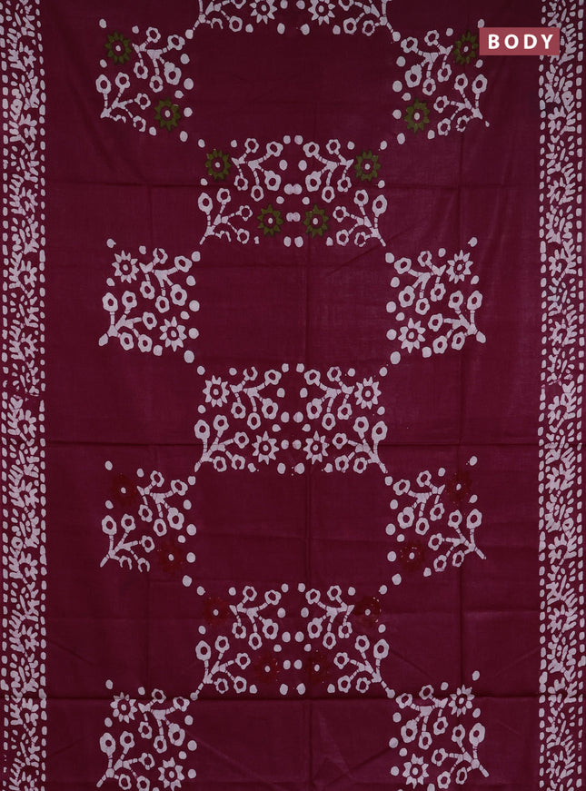 Batik cotton saree wine shade with batik butta prints and batik printed border