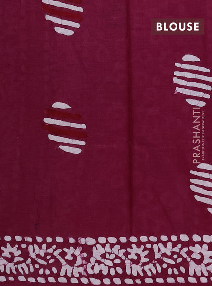 Batik cotton saree wine shade with batik butta prints and batik printed border
