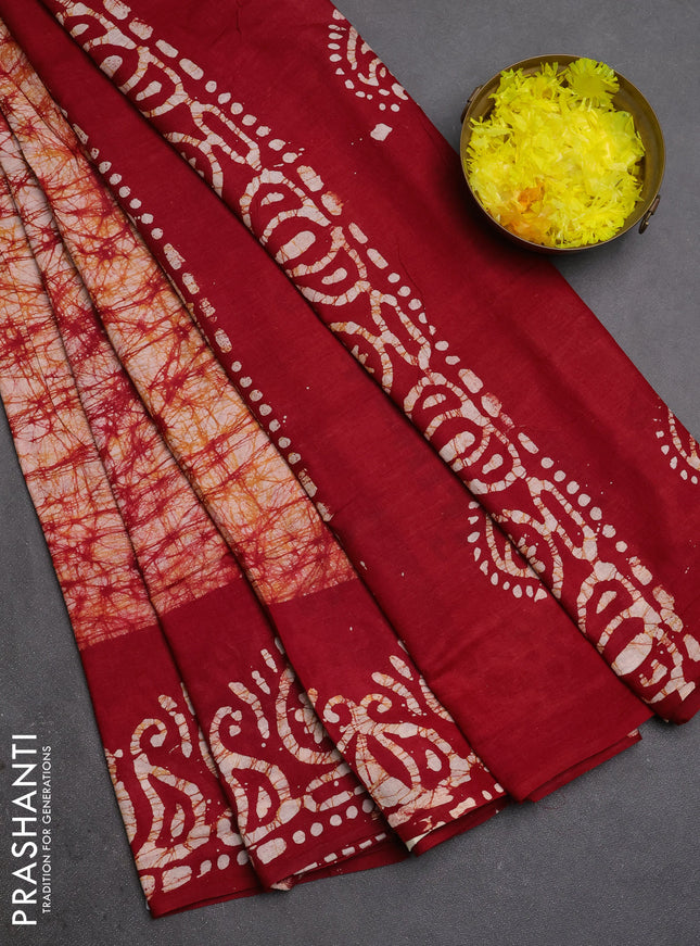 Batik cotton saree maroon with allover prints and batik printed border