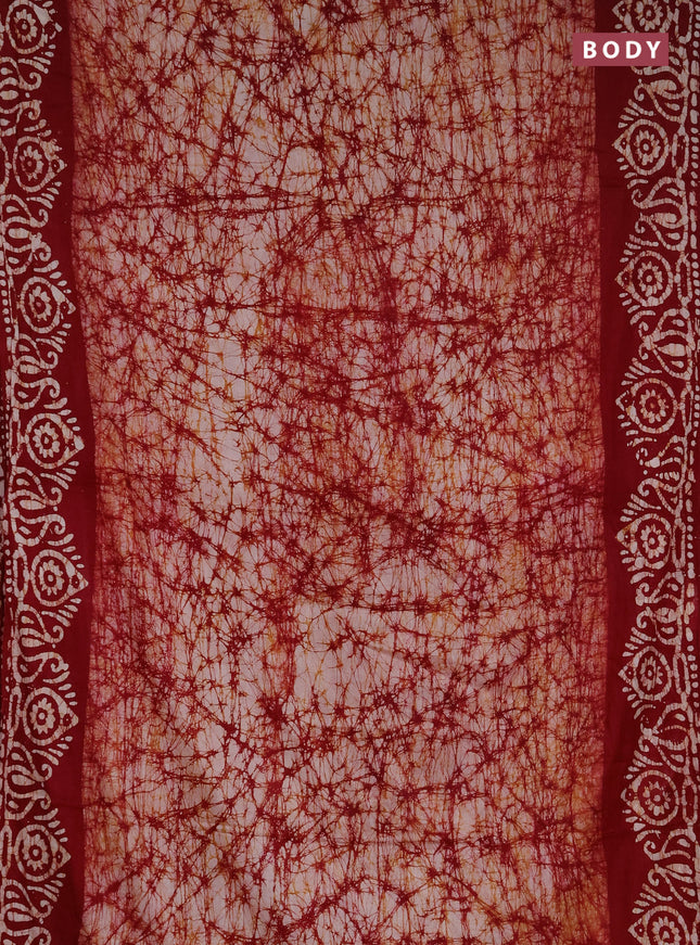 Batik cotton saree maroon with allover prints and batik printed border