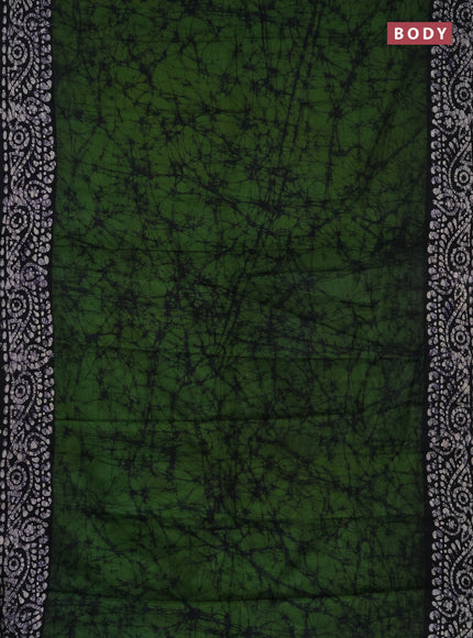 Batik cotton saree green and navy blue with allover prints and batik printed border