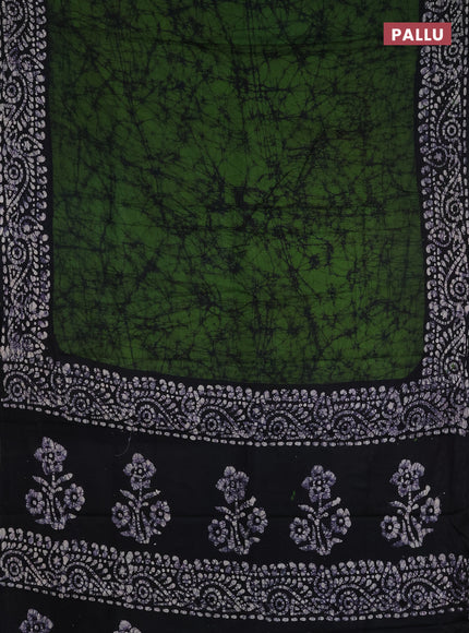 Batik cotton saree green and navy blue with allover prints and batik printed border
