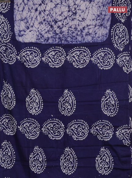 Batik cotton saree off white and navy blue with allover prints and batik printed border