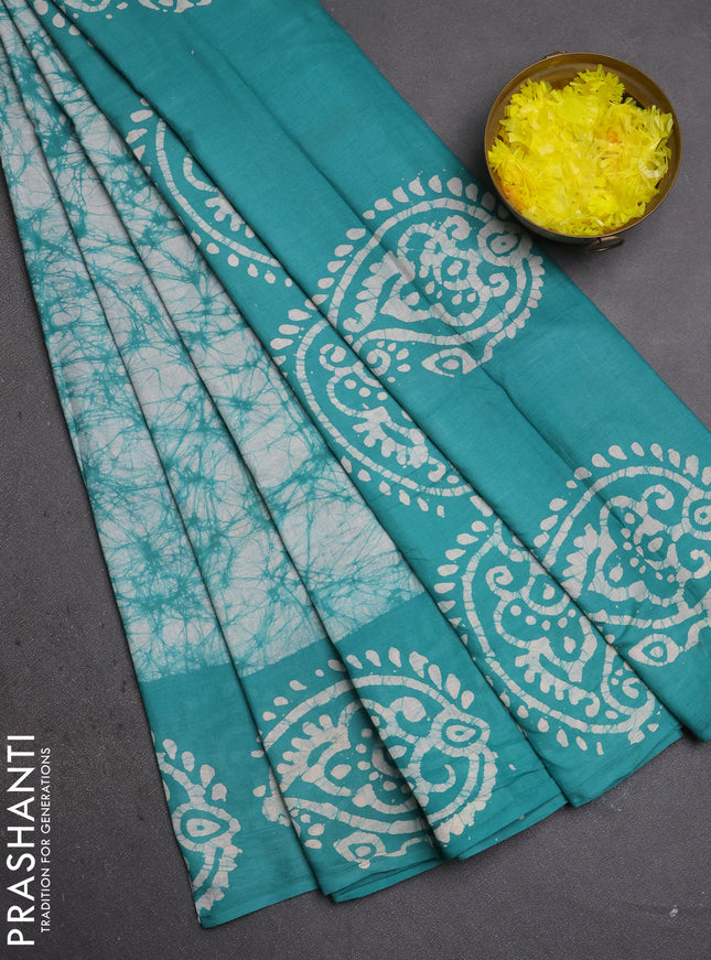 Batik cotton saree teal green with allover prints and batik printed border