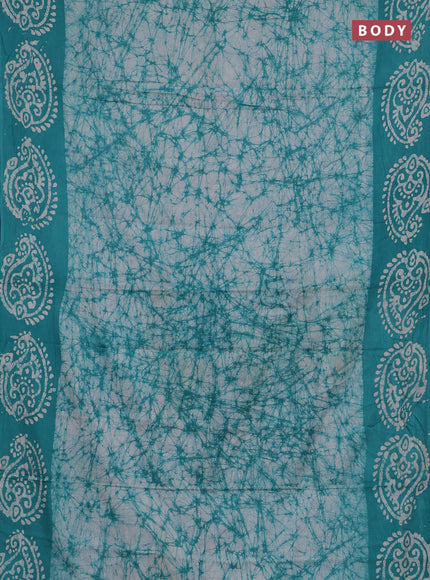 Batik cotton saree teal green with allover prints and batik printed border