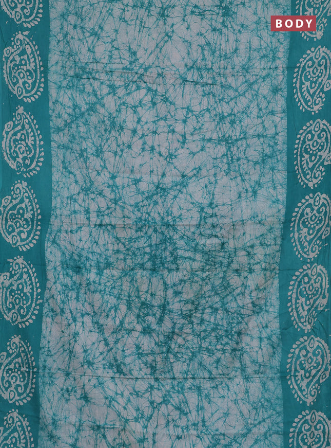 Batik cotton saree teal green with allover prints and batik printed border