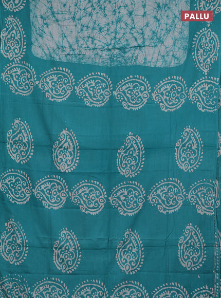 Batik cotton saree teal green with allover prints and batik printed border