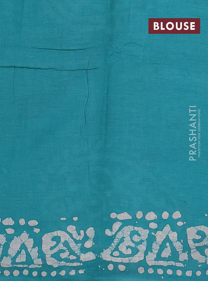 Batik cotton saree teal green with allover prints and batik printed border