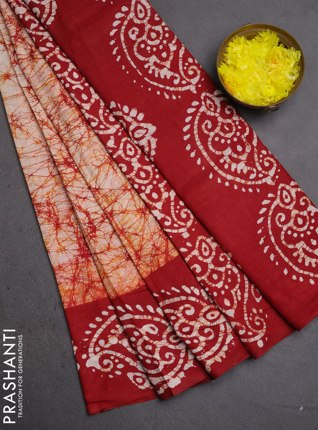 Batik cotton saree maroon with allover prints and batik printed border