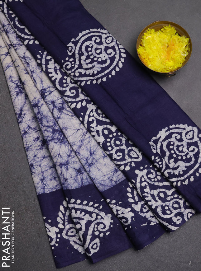 Batik cotton saree navy blue with allover prints and batik printed border