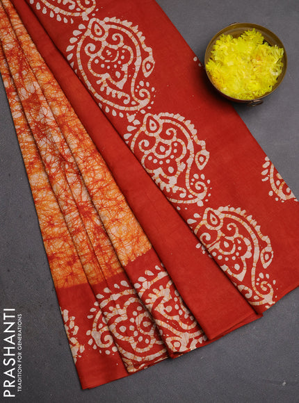 Batik cotton saree rust shade with allover prints and batik printed border