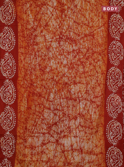 Batik cotton saree rust shade with allover prints and batik printed border