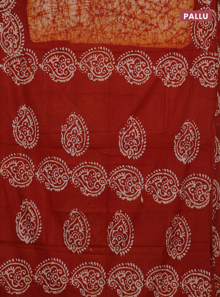 Batik cotton saree rust shade with allover prints and batik printed border