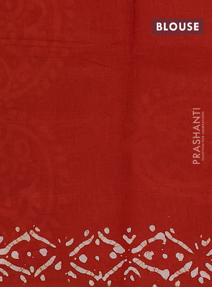 Batik cotton saree rust shade with allover prints and batik printed border