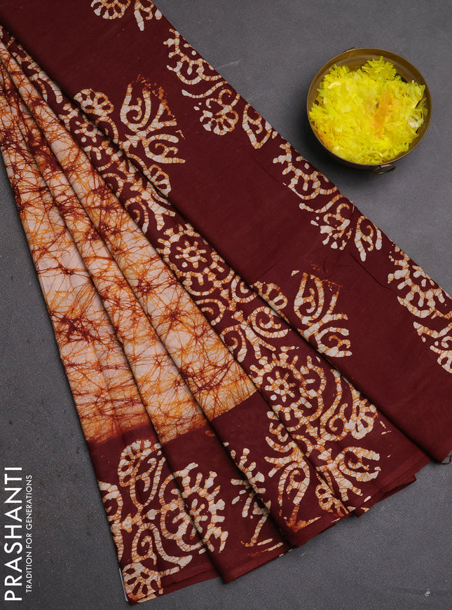 Batik cotton saree mustard yellow and deep maroon with allover prints and batik printed border