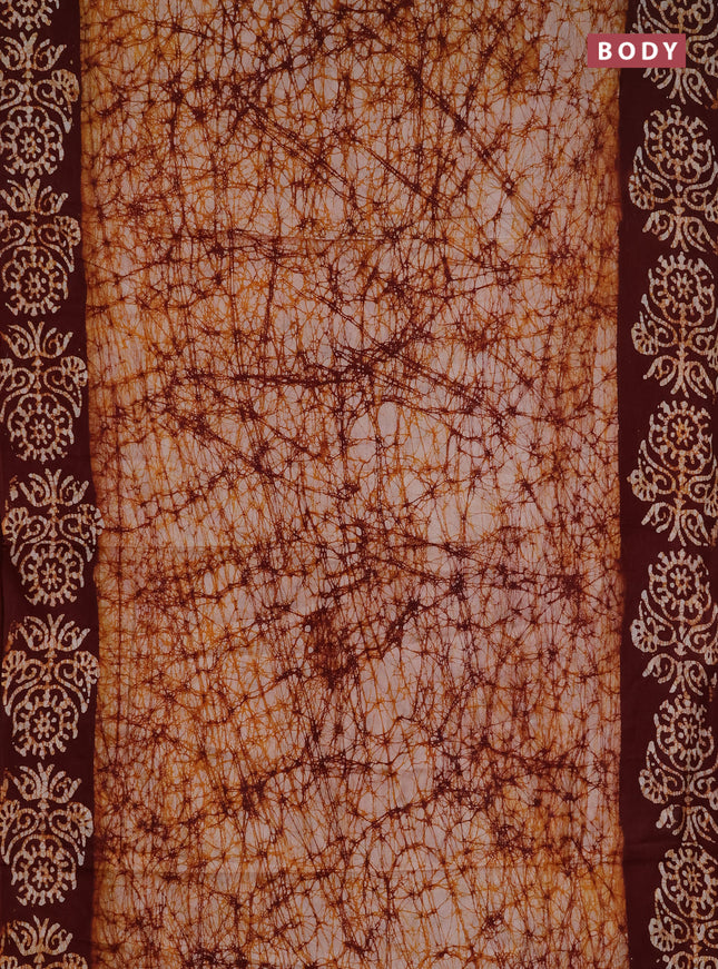 Batik cotton saree mustard yellow and deep maroon with allover prints and batik printed border