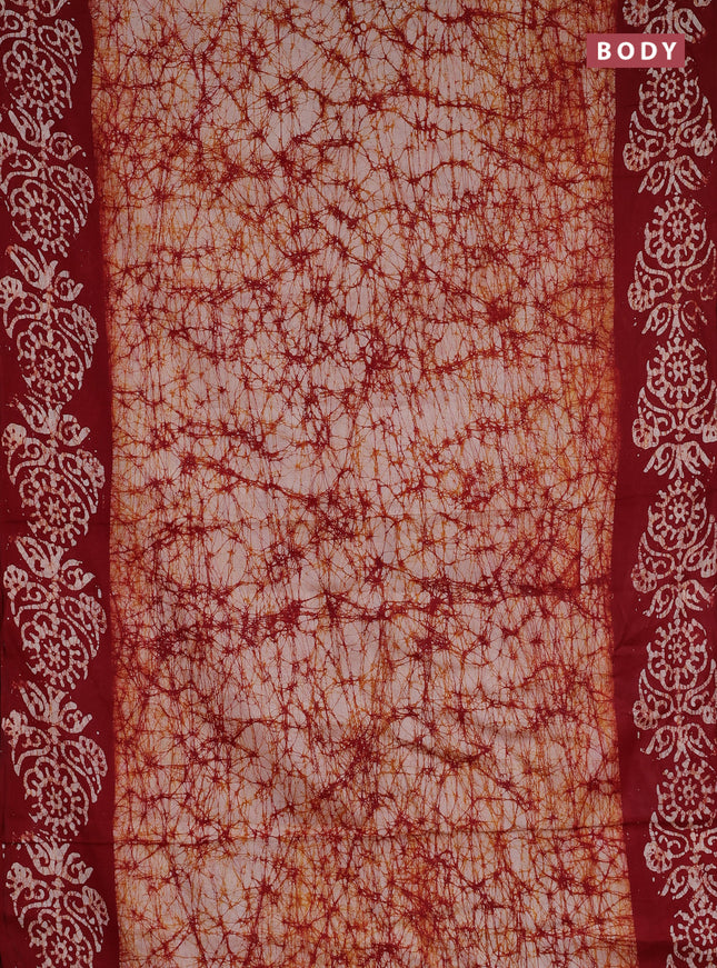 Batik cotton saree maroon with allover prints and batik printed border