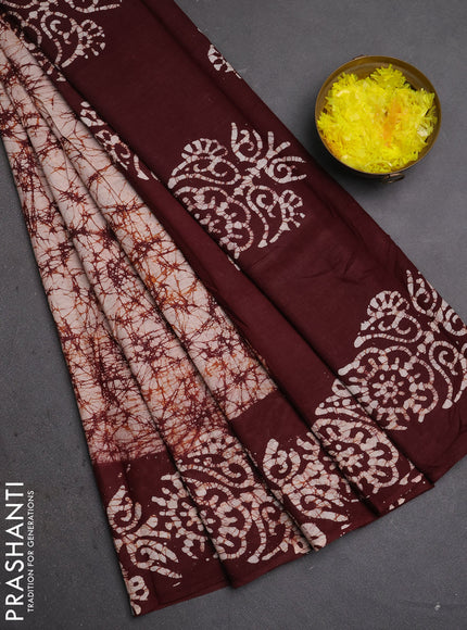 Batik cotton saree beige and coffee brown with allover prints and batik printed border